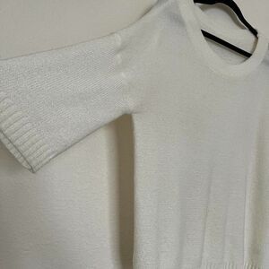 A cozy cream-colored sweater Size L